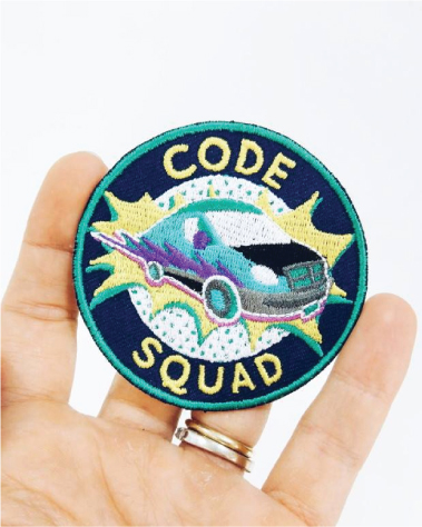 The Code Mobile design on an embroidered badge