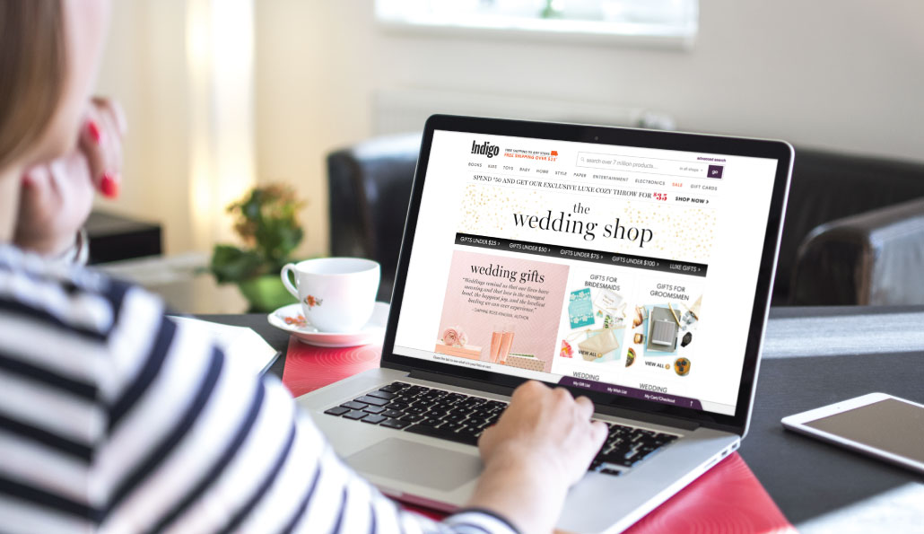 The Indigo Online Wedding Shop shown on a macbook